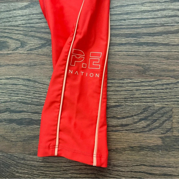P.E. NATION Red Cutshot Leggings size large - Picture 5 of 7